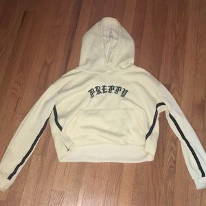 yellow "preppy" sweatshirt